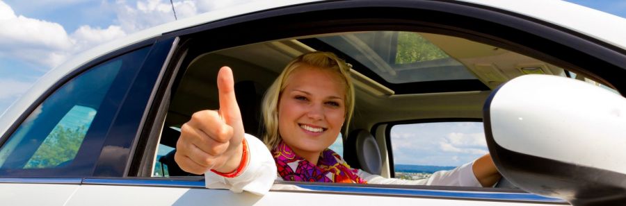Lady gives the thumbs up after her radiator repair in Wellington